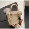 Bolso de mano versátil de moda transfronterizo gran capacidad moda femenina simple de lana de cordero bandolera retro bolso cubo esmerilado