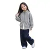 Chaqueta Casual Holgada Versátil con Cuello Alto para Niñas Primavera y Otoño 2026 Nuevo Estilo Coreano Moda Color Sólido Cremallera Chaqueta de Moda