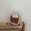 Bolsa de Hilo de Diseño Único 2026 para Mujer, Nueva de Moda con Cadena de Perlas Texturizada Elegante Bolso Cubo de Hombro Cruzado