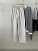 Pantalones rectos finos de principios de otoño con bolsillos falsos para mujer, nueva versión coreana elegante, adecuados para ir al trabajo, corte holgado, adelgazantes, versátiles, pantalones de pierna ancha con retazos