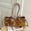 Bolsa de ombro casual grande capacidade 2026 transfronteiriça para mulheres, bolsa tote simples para o dia a dia, bolsa versátil de ombro com estilo descontraído