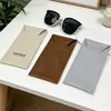 Bolsa de almacenamiento para gafas de cuero PU, estuche para guardar bolígrafos de negocios, bolsa pequeña para artículos de mano de viaje, bolsa de embalaje para almacenamiento de joyas