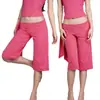 Pantalones deportivos de yoga de cintura alta estilo europeo y americano, nuevos de verano INS transfronterizos con cintas, pantalones ajustados de cintura baja de seis puntos para mujer al por mayor