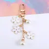 Chaveiro Pingente de Flor Colorida com Gotejamento de Óleo Dupla Face Transfronteiriço Acessórios de Liga de Zinco Pérola Decoração para Case de Fone de Ouvido Bolsa