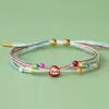 Pulsera Trenzada Multicolor Estilo Nacional con Colgante de Aleación Esmaltada, Ajustable, Accesorio de Mano Estilo Nacional de Paz y Buena Suerte