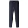 Pantalones casuales para hombre 2026 transfronterizos, forrados de polar y engrosados para abrigar, pantalones rectos de algodón, nuevos estilos de otoño/invierno, pantalones de longitud media para hombres de mediana edad
