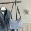 Bolso de mano plisado de estilo moderno y dulce para mujer, nueva colección de verano 2026, tela de pana con lunares, bolso de hombro versátil y bolso de axila