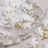 2026 Caja de Accesorios para Uñas, Conchas y Estrellas de Mar, Perlas de Acero Grandes y Pequeñas, Flor Blanca Translúcida de Cinco Pétalos para Decoración de Uñas