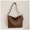 Bolso de mujer casual retro de gran capacidad 2026 nuevo popular de venta caliente versátil elegante bolso de hombro bolso cubo super popular