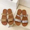 Sandalias planas de pedrería estilo francés 2026 nuevo modelo de verano, pantuflas ligeras y versátiles de punta redonda para combinar con faldas