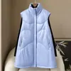 Ropa de cantidad pequeña 2026 otoño e invierno estilo nuevo chaleco genuino de piel de oveja con plumón de pato blanco abrigo casual de longitud media para mujer