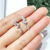 Pendientes pequeños de circonita simples y exquisitos con incrustaciones japonesas y coreanas, pendientes Dongyu al por mayor con personalidad dulce