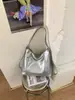 Nueva bolsa de estudiante de gran capacidad para mujer, versátil y texturizada, bolso de un solo hombro bajo el brazo, bolso de mano de cuero suave de moda