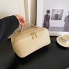 Nueva bolsa de cosméticos con patrón tejido para mujer, gran capacidad, práctica y de alto nivel, súper popular, para viajes, cosméticos y artículos de tocador.
