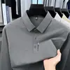 Camiseta de manga larga de alta gama para hombre, primavera/otoño 2026, cuello camisero, polo de retazos, color liso, top versátil estampado