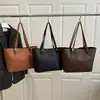 Bolso de Hombro Simple de Color Sólido de Gran Capacidad Bolso de Mano Casual Nuevo Estilo 2025 Bolso Tote Bolso para Viajar al Trabajo Bolsos de Axila para Mujer de Comercio Exterior
