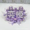 Etiqueta de nombre con soporte para abanico de dos caracteres Yaxuan, producto terminado de tela no tejida con letras reflectantes, colgante creativo para soporte de abanico puramente hecho a mano, mercancía de la comunidad de abanicos