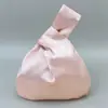 Bolso de Muñeca Nuevo Estilo Coreano de Satén Moda Caramelo Regalo Bolso de Mano Personalizado Ins Bolso Tote de Satén de Seda