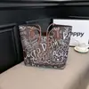 Bolsa Tote de Mão com Grafite para Mulheres Nova Coleção Primavera/Verão 2026 Bolsa de Ombro Casual Grande Capacidade Bolsa de Axila Bolsa Transversal