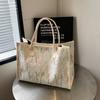 Bolso informal pequeño de crowdsourcing para mujer, de gran capacidad, nuevo, de moda 2024, bolso de hombro portátil súper popular, bolso de mano para ir al trabajo que combina con todo.