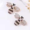 Pendientes de aleación con diseño simple de lujo ligero, moda exquisita transfronteriza, pendientes de abeja de insecto totalmente engastados con diamantes, pendientes diarios versátiles para mujer