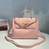 Bolso Tote de Cuero Genuino de Gran Capacidad Nuevo de Otoño Hebilla de Cuerda Metálica de Nicho Bolso Cruzado de Hombro Tejido para Mujer