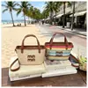 Bolsa de palha trançada feminina transfronteiriça novo modelo 2026 estilo férias na praia bolsa transversal trançada bolsa de balde de mão de verão