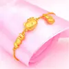 Versión coreana de la pulsera KT chapada en oro, joyería de oro duro 3D chapada en cobre, pulsera con cabeza de gato y moneda europea para mujer, venta directa al contado de fábrica
