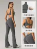 Conjunto de una pieza sexy sin espalda transfronterizo, Ropa deportiva de fitness para mujer con efecto push-up en glúteos color durazno, Conjunto de una pieza ligeramente acampanado para yoga para mujer Dlt005