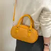 Bolso de textura tejida para mujer 2026 nuevo estilo moderno de verano tacto de alta gama bolso de mano tipo bola de boliche bolso cruzado de un solo hombro para el trabajo