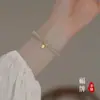 Pulsera de la suerte de perlas ultrafinas para mujer estilo Ins pulsera de lujo ligero nicho alta gama pulsera de Hetian Yu regalo al por mayor