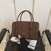 Bolso de mano de moda para viajeros 2025 Nuevo estilo coreano Simple Elegante Axila Portátil Forro polar Bolso cuadrado pequeño Bandolera