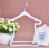 Percha de plástico para ropa infantil tienda de ropa especial percha para traje mono percha infantil gancho de hierro giratorio percha para mono