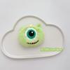 Lindo broche de monstruo de lana azul de dibujos animados verde de ojos grandes, accesorios colgantes para mochila escolar, muñeco de peluche morado de boca grande