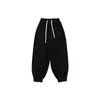 Pantalones de pana forrados de polar para niña 2026 otoño e invierno nuevos pantalones zanahoria versátiles para niños pantalones largos holgados para niñas
