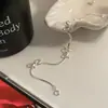 Pulsera de Hueso de Serpiente con Lazo Plateado para Mujer Nicho Exquisito Gama Alta Simple Joyería de Mano Ins Estilo Fresco Accesorios de Collar