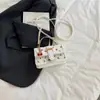 Bolso de Mano de Moda de Alta Apariencia Estilo Coreano 2026 Primavera Nuevo de Moda Nicho Bolso Cruzado Elegante Simple Cuadrado Pequeño
