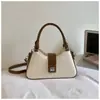 Bolsa de Mão de Alto Valor Feminina 2026 Outono Inicial Nova Bolsa de Ombro para o Trabalho Design Simples Moderno Nicho Bolsa de Ombro Único Transversal