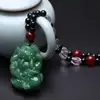 Colgante de collar de jaspe Hetian artificial marca Dragón Jaspe Imitación cadena para suéter de otoño e invierno venta al por mayor