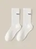 Calcetines de otoño e invierno hasta la pantorrilla Zhuji para hombre, desodorantes, absorbentes de sudor, transpirables, calcetines deportivos de caña alta, calcetines de moda para hombre y mujer, para todo