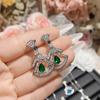 Cadena de clavícula con diseño en forma de abanico de diamantes de colores del mismo estilo con forma de estrella de camelia chapada en oro 18, estilo francés, lujo ligero, exquisita y elegante joyería para las orejas