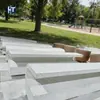 Fábrica de Guangdong bancos de terrazo hechos a medida, bancos largos de piedra para parques al aire libre, asientos paisajísticos GRC para alcorques al por mayor