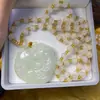 Nuevo jade blanco claro lujo ligero imitación bola de mármol blanco colgante de jade unicornio de doble cara valiente fábrica directa para transmisión en vivo
