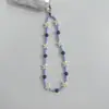 Venta al por mayor del fabricante Nuevo modelo Gato Kt Lazo Cadena para teléfono Colgante de cadena para teléfono con cuentas hecho a mano Decoración para niñas