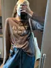 Además, el nuevo modelo de otoño es una camiseta de estilo retro americano con letras desgastadas, cuello redondo y mangas largas, adecuada para uso casual, MQ1763