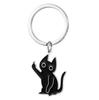 Venda transfronteiriça chaveiro de gatinho inconformado desenho animado engraçado chaveiro de aço inoxidável dedo do meio vertical pingente de gato preto