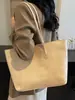 Bolso tote de gran capacidad estilo coreano, nuevo modelo principios de otoño 2026, bolso de hombro casual simple para el trabajo y los desplazamientos