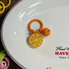 Llavero colorido de frutas con cascabeles, sandía, granada, guayaba, colgante de juguete de comida en miniatura, accesorio versátil para bolso