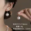 Pendientes de botón de perla Swarovski personalizados Pendientes de corazón con circonita Diseño de temperamento de lujo ligero Pendiente simple y versátil para mujer