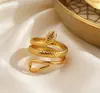 Anillos de estilo europeo y americano, retro y únicos, con diseños de serpiente y pitón, anillos abiertos de acero de titanio, anillos versátiles de acero inoxidable, joyería al por mayor